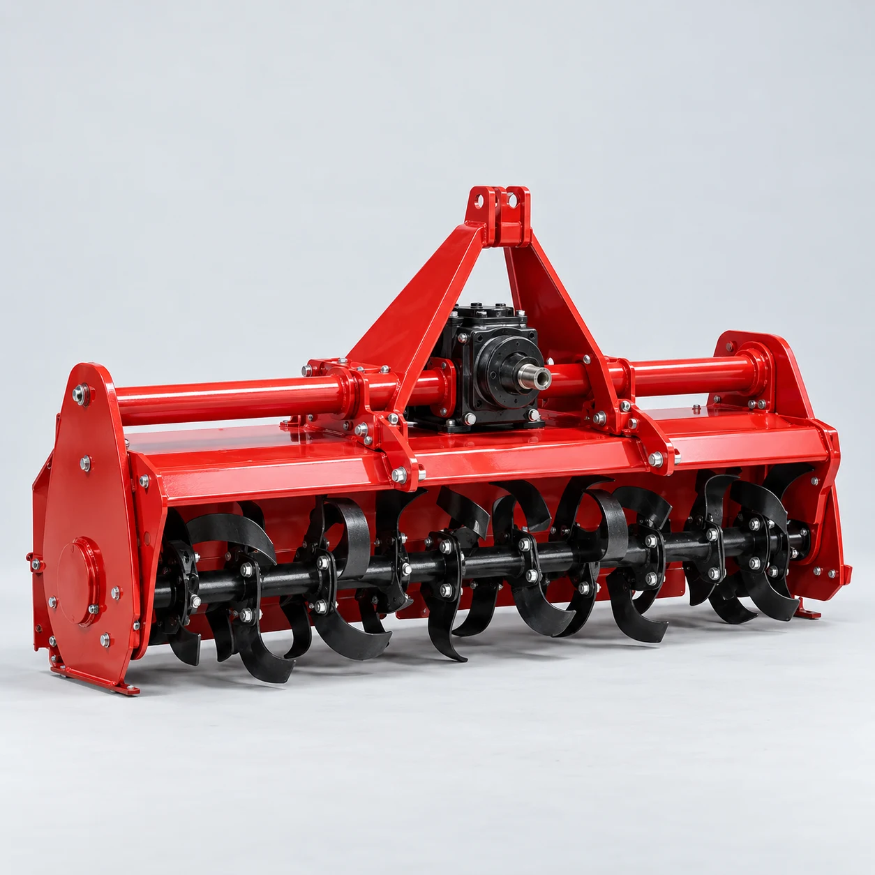 Red rotary tiller tractor attachment