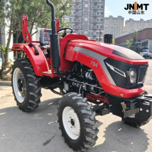 Red YTO-704 tractor outdoors, front three-quarter view