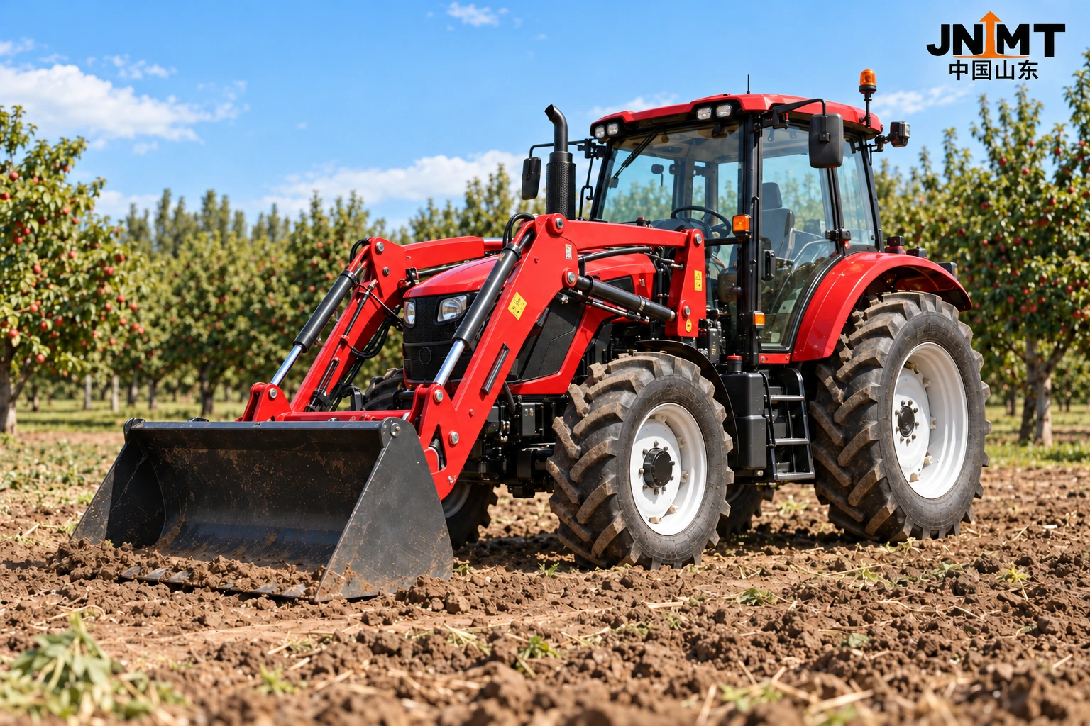 Red tractor with front loader in an orchard